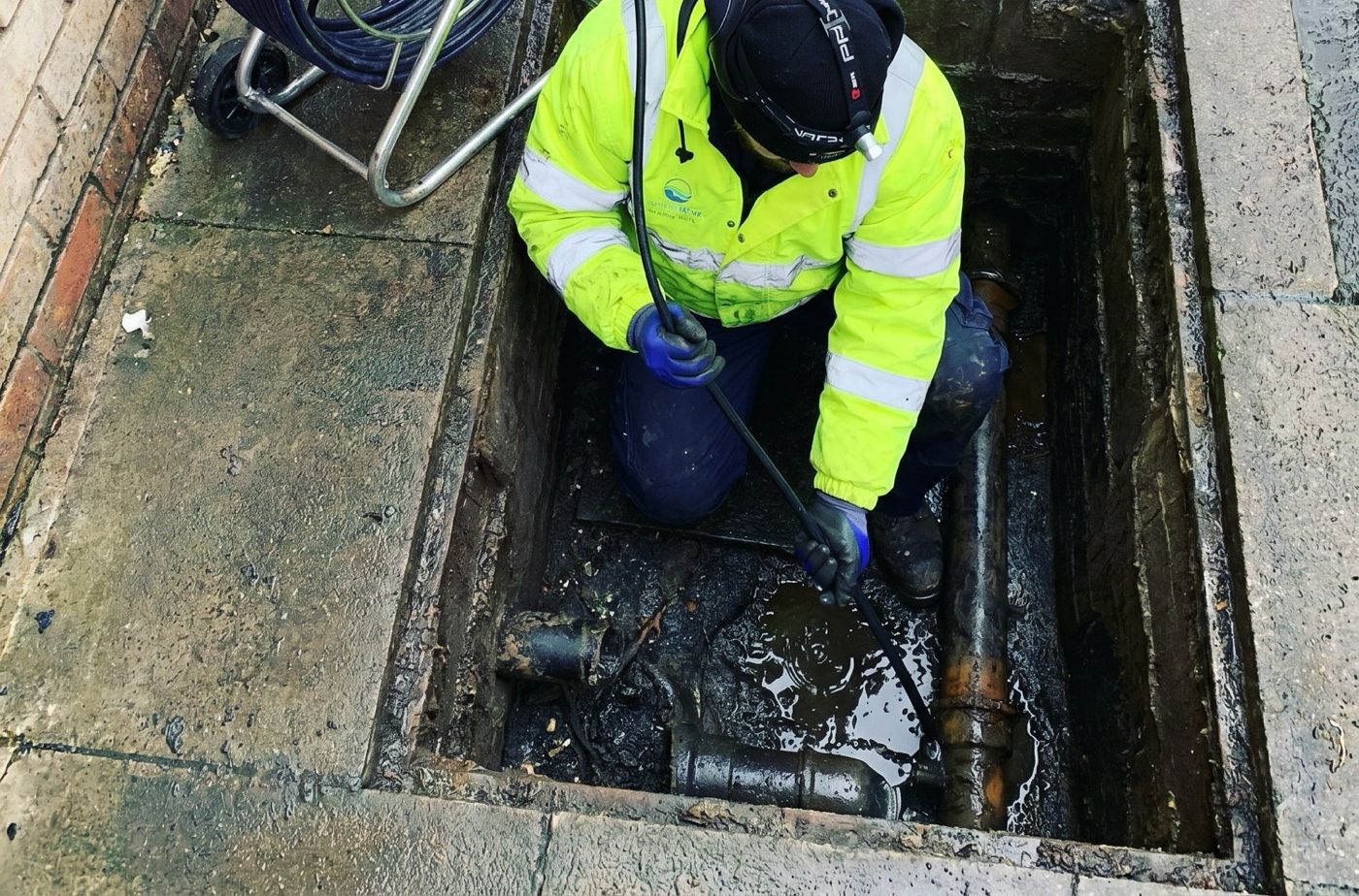 A1 engineer running a CCTV drain survey