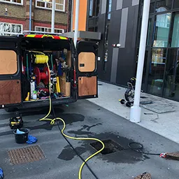 van with drain cleaning equipment